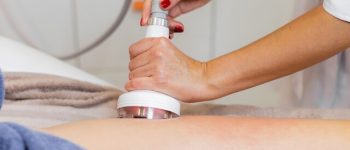 [freepicdownloader.com]-masseur-doing-anti-cellulite-massage-client-spa-beauty-salon-using-oil-large